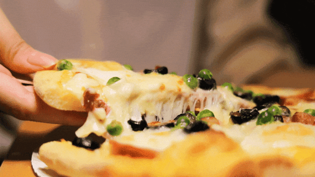 比萨星人速冲！达美乐比萨限时买一送一*比萨，美味加倍享！